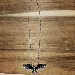 Owl pendant necklace may contain nickel